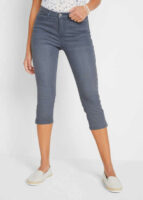 Moderní dámské strečové džíny v délce pod kolena